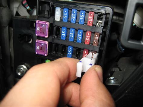 Replace a Fuse: 2004 Mazda 3 i 2.0L 4 Cyl. 